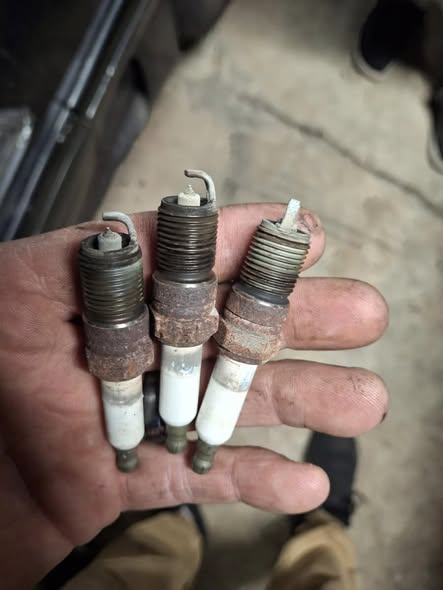 Worn spark plugs replaced during tune-up